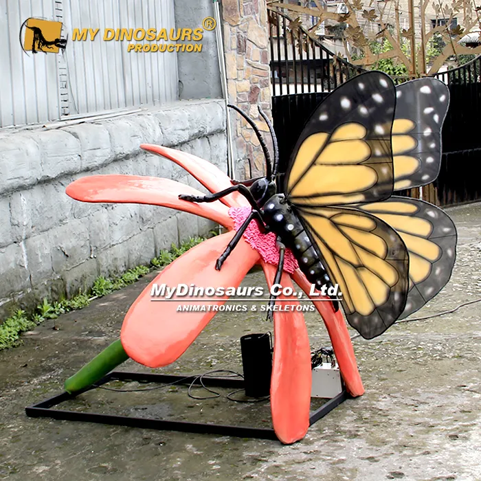 Yellow giant Butterfly on red flower